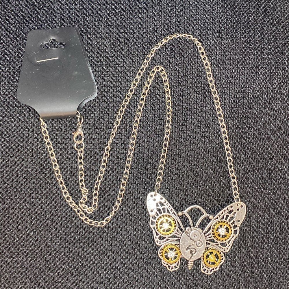 Industrial/Steam Punk Style
BUTTERFLY NECKLACE ~ 22" Long ~
New w/tags